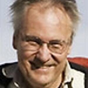 [Photo of Dr. Andrejs Skaburskis]