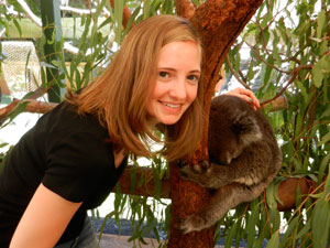 photo of Sarah Bingham with a sleepy koala