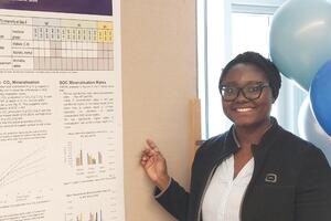 Julianah Adediji presenting research poster