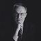 [Photo of Dr. Rowland Tinline]