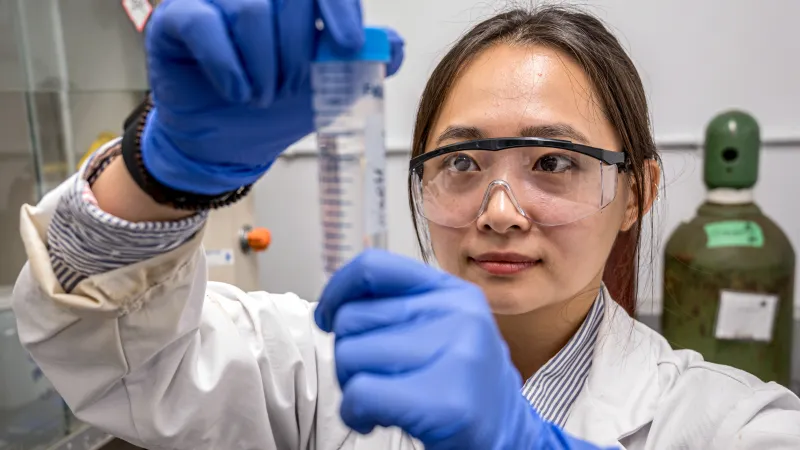 Photo of a student doing experiments