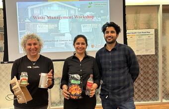 Participants in a Waste Management Workshop pose for a photo.