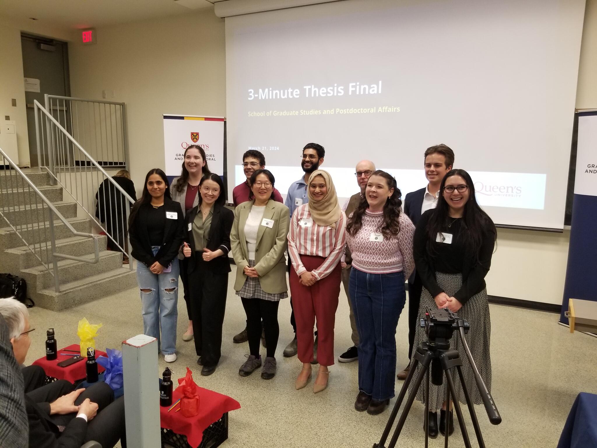 The participants of the 2024 3MT Finals pose for a photo.