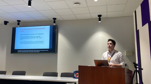 An image of Kai Siallagan presenting at the I@Q Conference in Stauffer Library