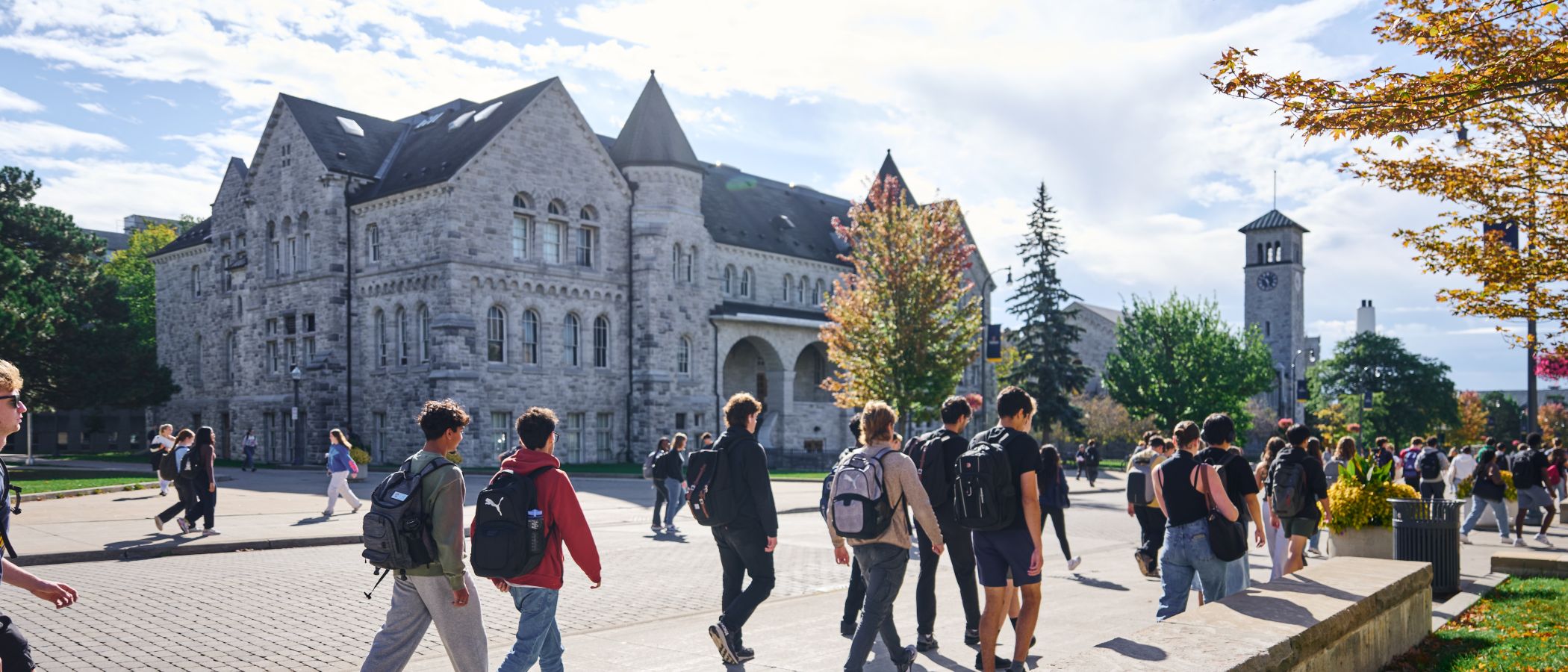 Students walking on campus in Fall 2024
