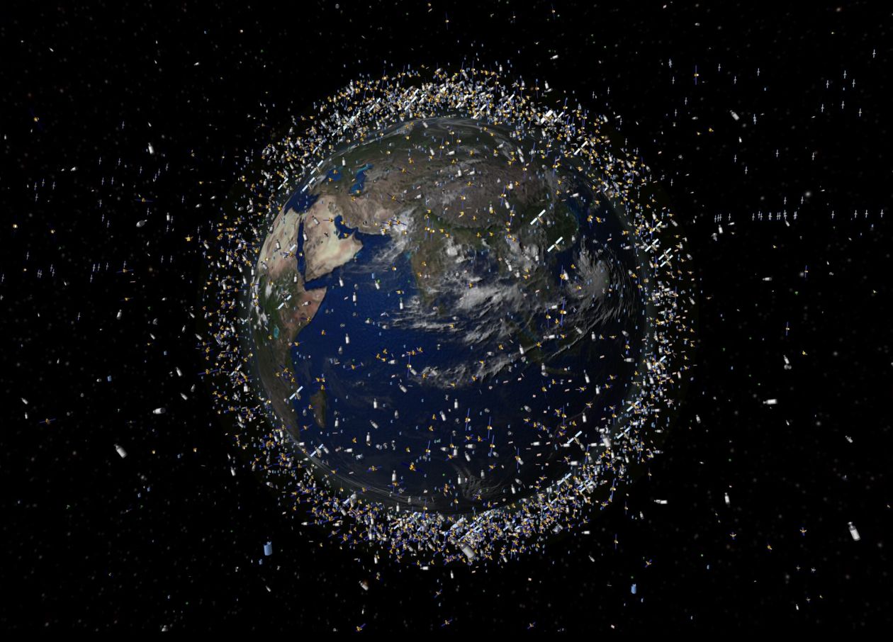An Artist's impression of a view from the Earth from space with space debris surrounding it 