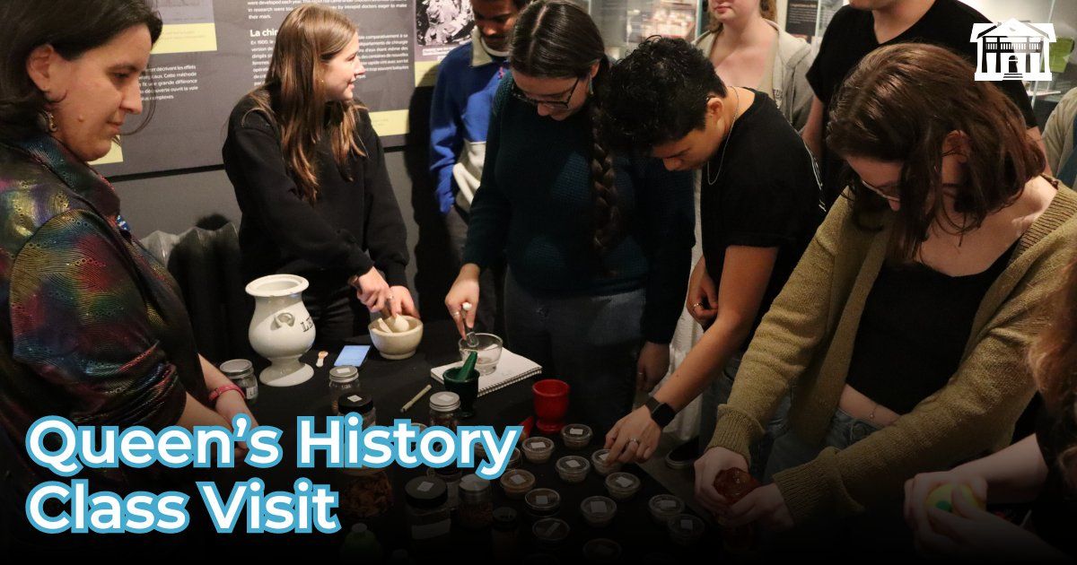 An image of students at the Museum of Health Care standing in front of a table of small labelled jars