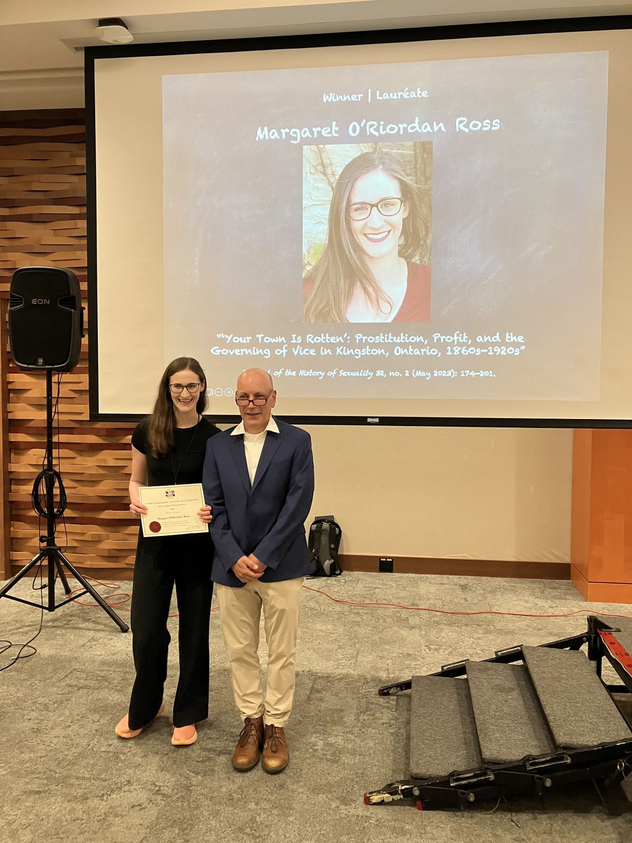 Maggie Ross receiving her award