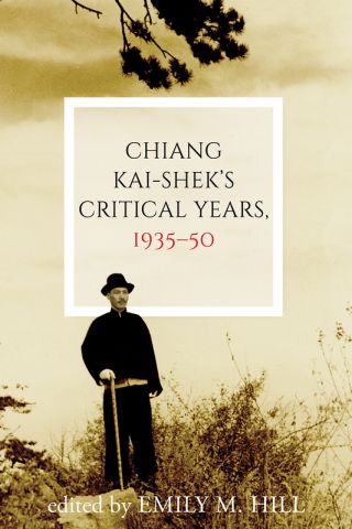 Cover of book shows a man in a black suit and hat standing on a hilltop with a cane, gazing out into the distance.