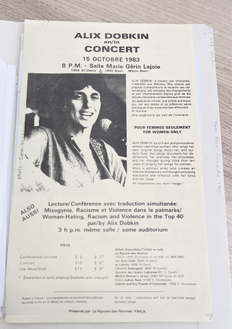 A black and white page featuring a women in the middle holding a guitar in front of a microphone