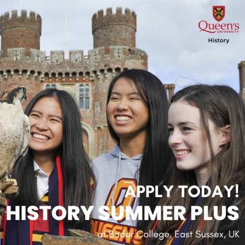 A photography of students smiling in front of Herstmonceux Castle looking at a falcon