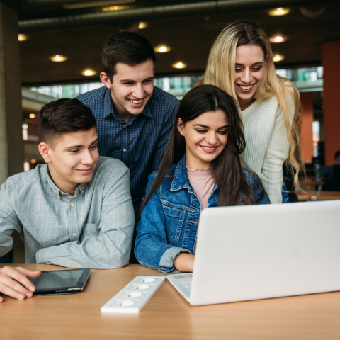 An image of students studying at a computer