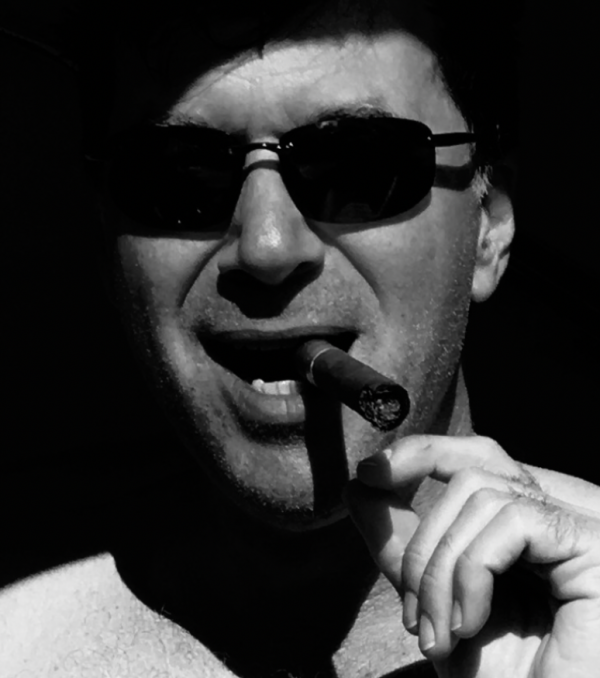 Black and white image of Douglas with a cigar