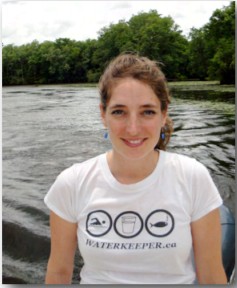 Image of Kathryn Tucker smiling on a lake