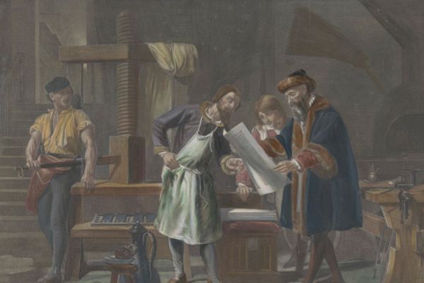 A painting of a man in a blue robe holding a printed page beside a large wooden printing press