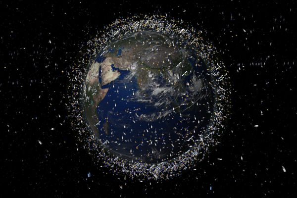 An Artist's impression of a view from the Earth from space with space debris surrounding it 