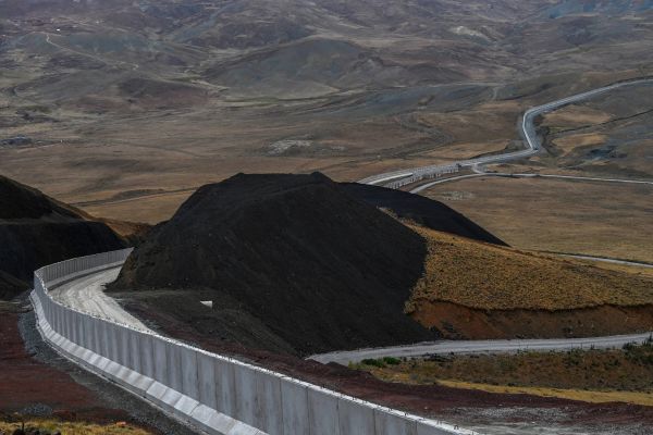 Turkey’s border wall cutting through Kurdish lands, Iran–Turkey border.