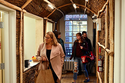 People touring the round room.