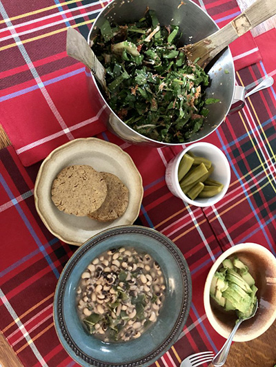 Salad, black eyed peas and collard greens.