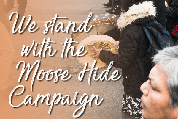 moose hide campaign promotion graphic drums and people walking