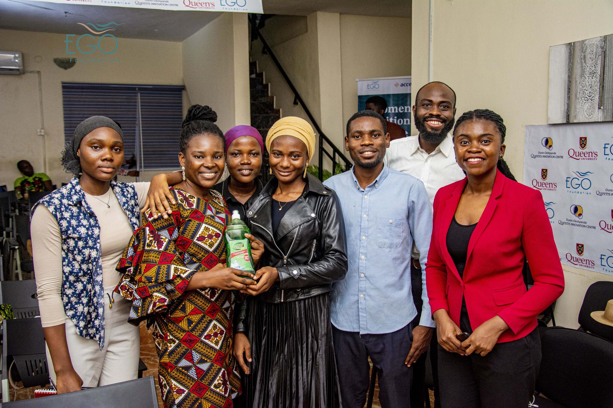 Machoice founder demonstrates their dishwashing  detergent at a JLMCF competition screening in Lagos