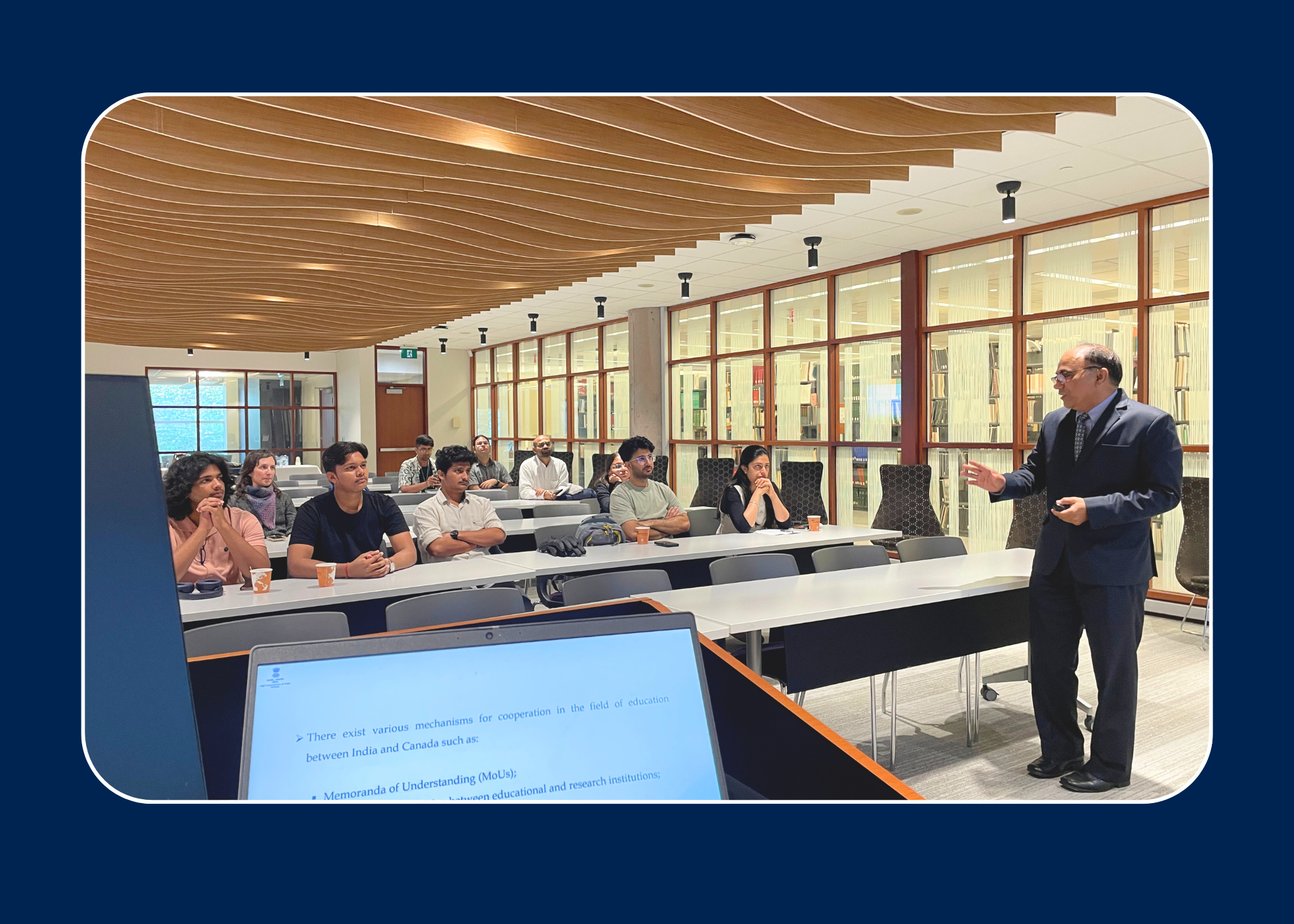 High Commissioner Mr. Kumar delivering orientation to 11 Queen's Students