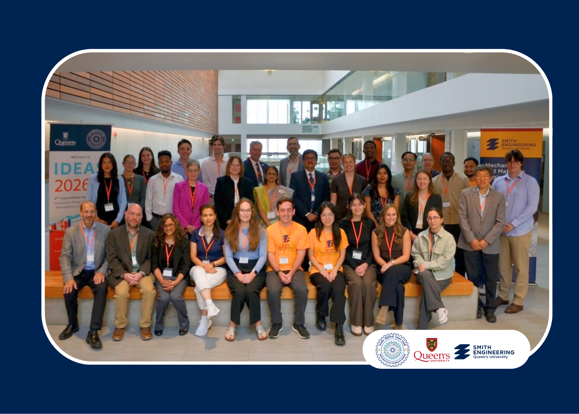 Participants at the IDEAS 2026 International Symposium pose for a group photo at Queen’s University.