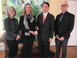 Photo of Minister Furuya with Sandra den Otter, Nick Mosey, and Keiko Aoki