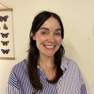 Rachel Brady - Headshot - Butterflies behind here