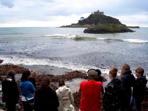 Students on a field trip by the sea