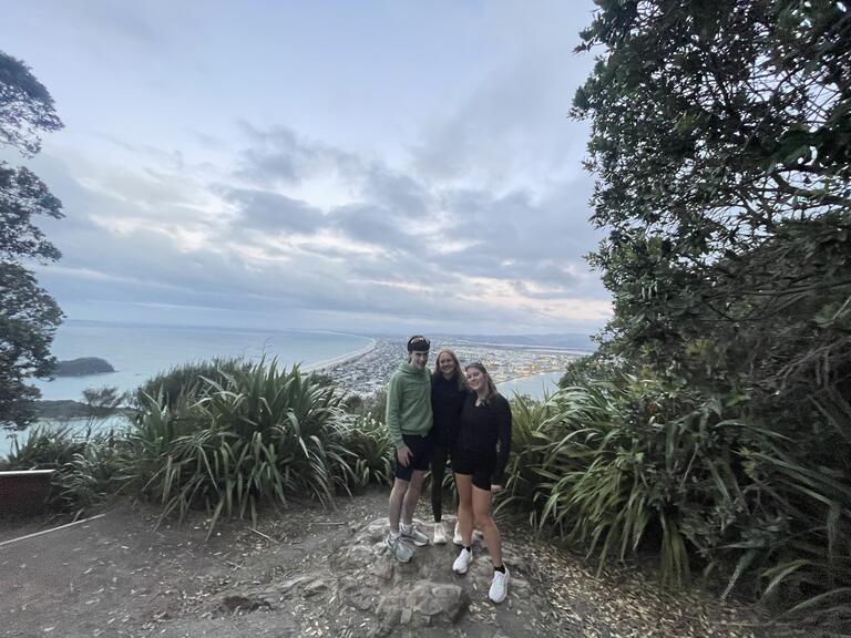 Sarah and friends in front of a view