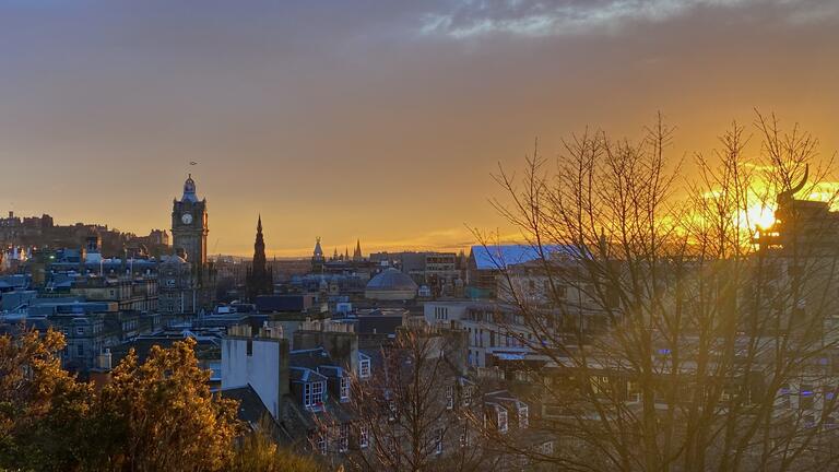 A view of Leeds and the rising sun