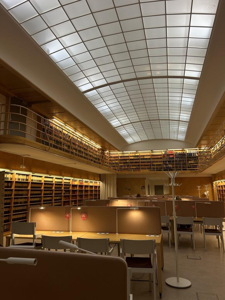 A modern library with warm lighting