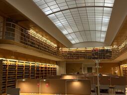 A modern library with warm lighting