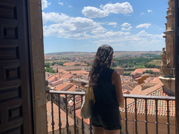 Student stands are balcony overlooking the city below