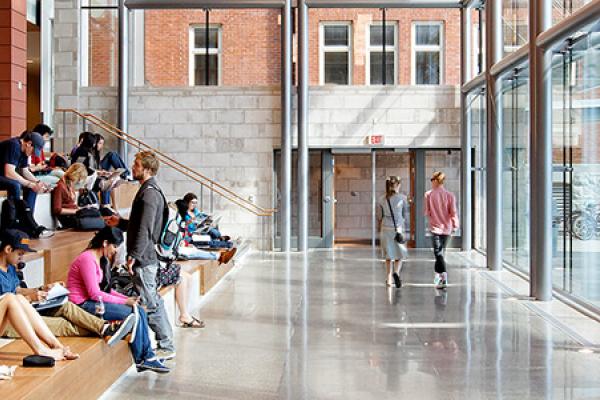 Students sitting and collaborating in the Smith School of Business 