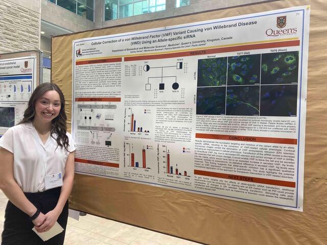 Ashley presenting her poster