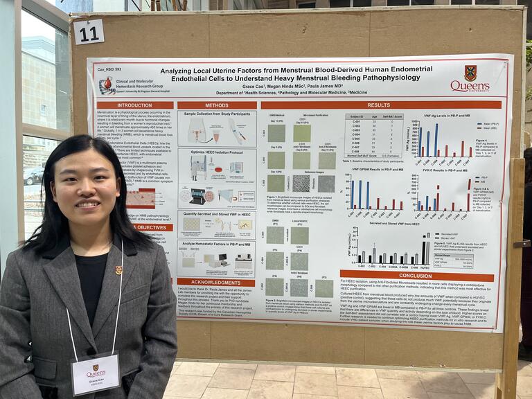 Grace Cao presenting her poster at Queen's University