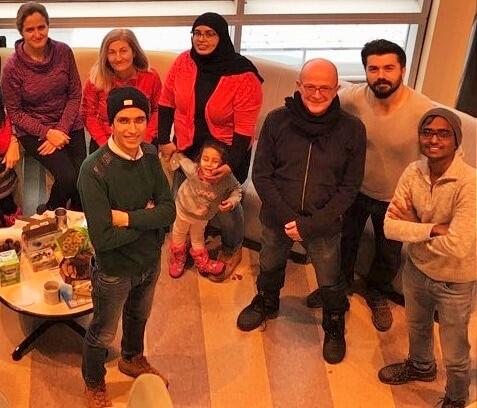 A group of people partying in a room