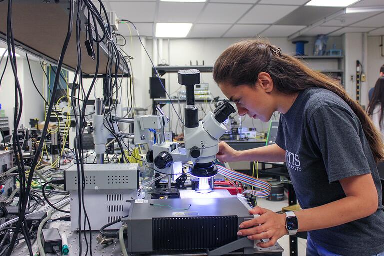 PhD Candidate, Maryam Moridsadat, testing photonic integrated circuits.