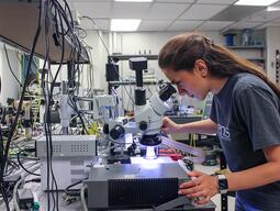 PhD Candidate, Maryam Moridsadat, testing photonic integrated circuits.