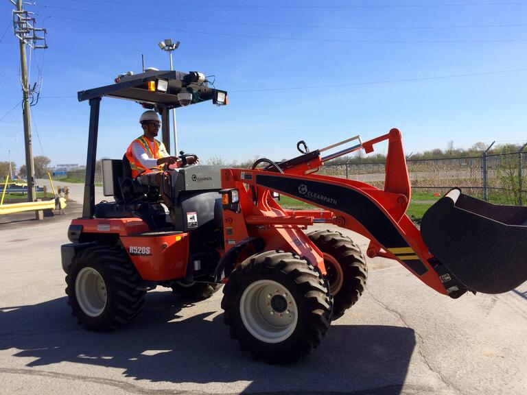 Heshan on loader at Innovation Park.