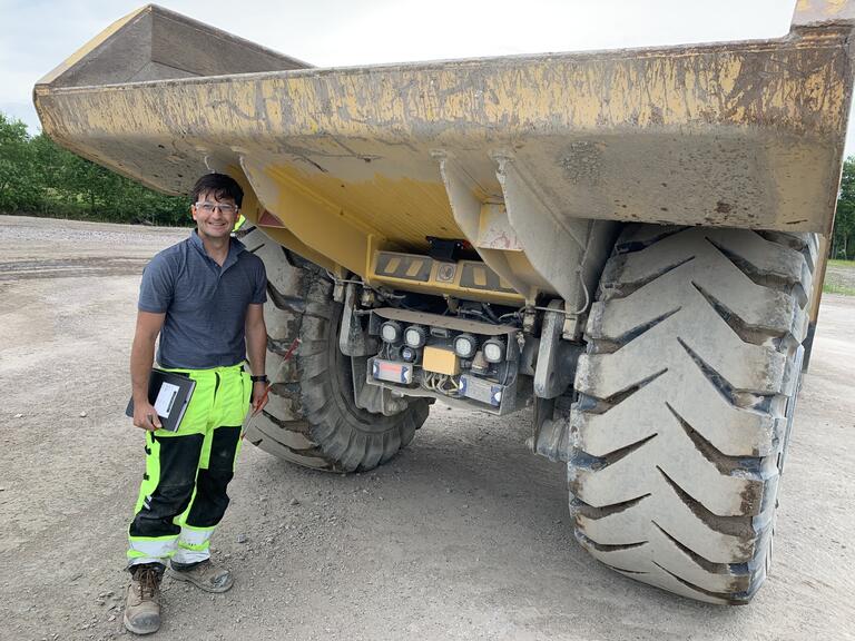 Unal with dump truck.