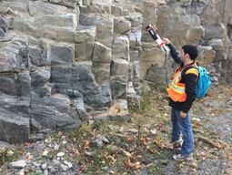Marc Gallant scanning a rock cut with AxixMapper.