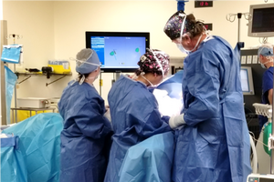 Surgeons working in an operating room