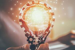 Lightbulb with a graphic of a glowing brain emanating from it