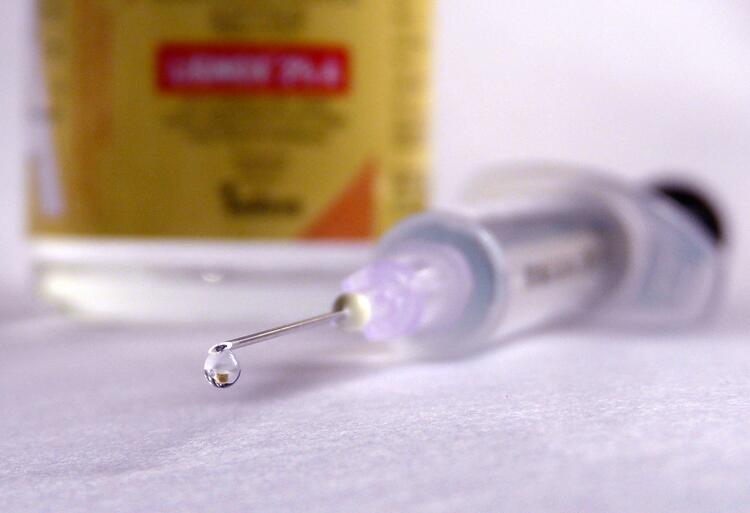 Syringe dripping saline drop