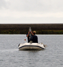 Collecting sediment core