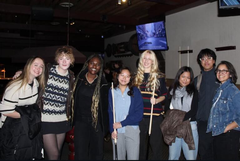 Students and prof pictured at the Grizzly Grill.