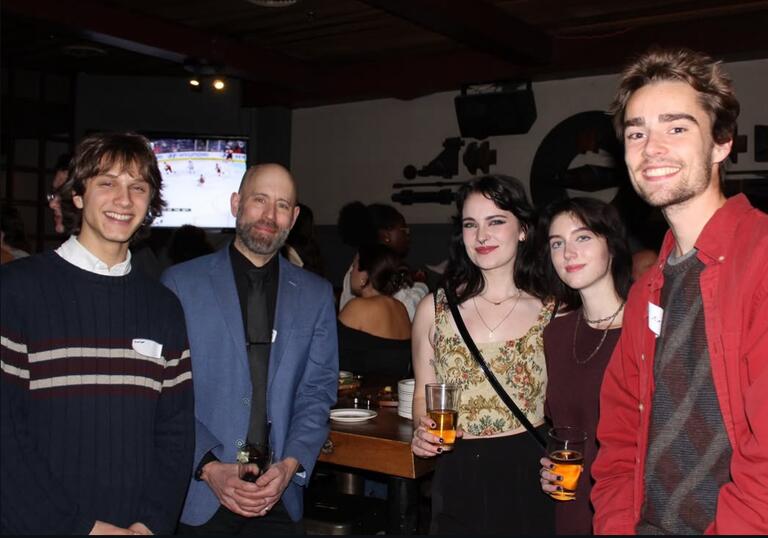 Students and prof pictured at the Grizzly Grill.
